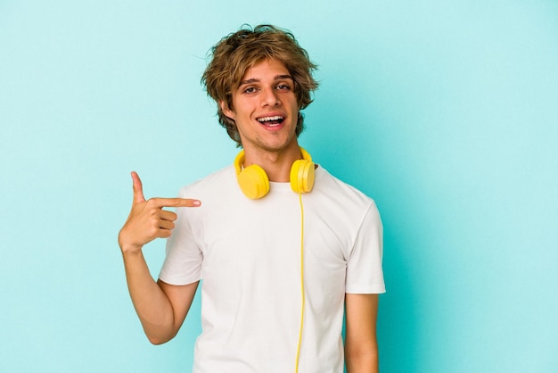 Person pointing by hand to a shirt copy space proud and confident