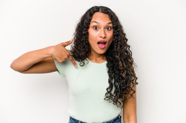 Person pointing by hand to a shirt copy space proud and confident