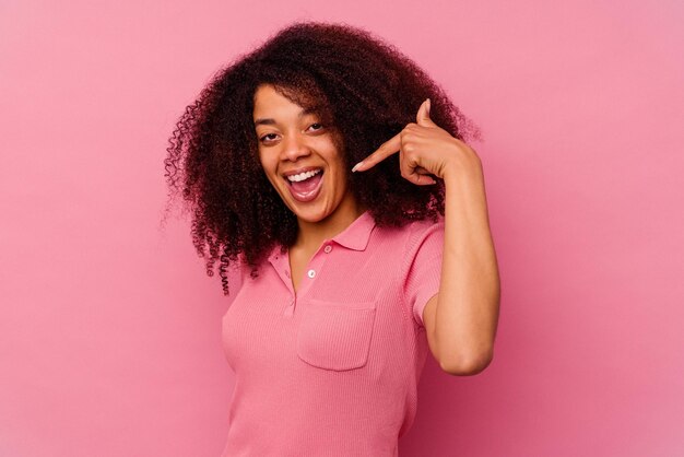 Person pointing by hand to a shirt copy space proud and confident