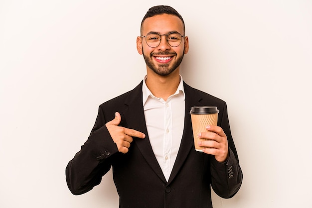 Person pointing by hand to a shirt copy space proud and confident