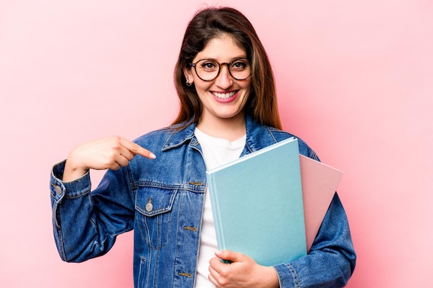 Person pointing by hand to a shirt copy space proud and confident