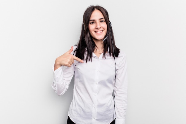 Person pointing by hand to a shirt copy space proud and confident