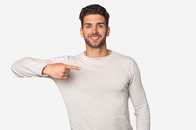 Person pointing by hand to a shirt copy space proud and confident