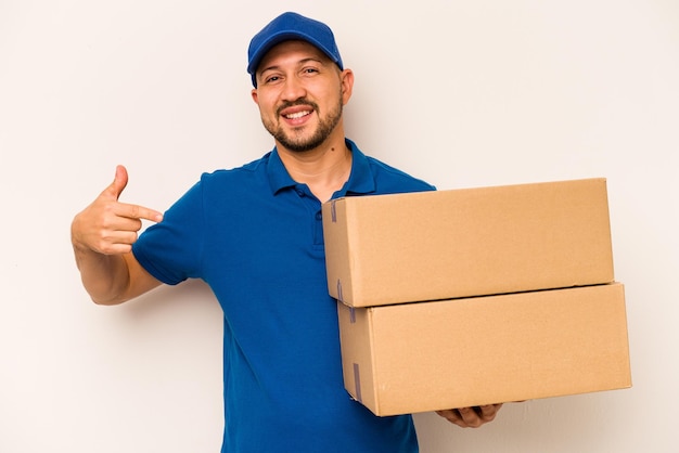 Person pointing by hand to a shirt copy space proud and confident