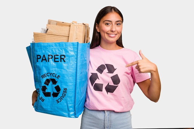 Person pointing by hand to a shirt copy space proud and confident