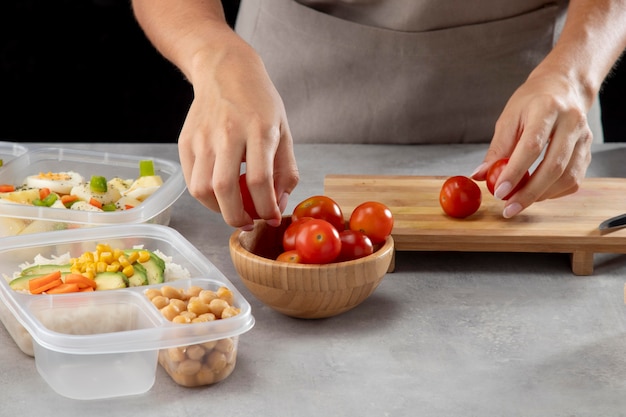 Photo person practicing batch cooking with healthy food