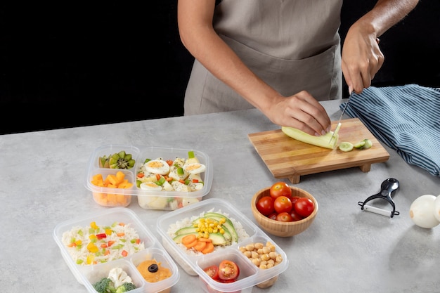 Photo person practicing batch cooking with healthy food