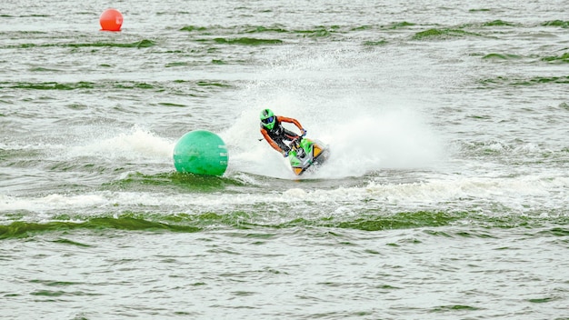 person riding a kayak