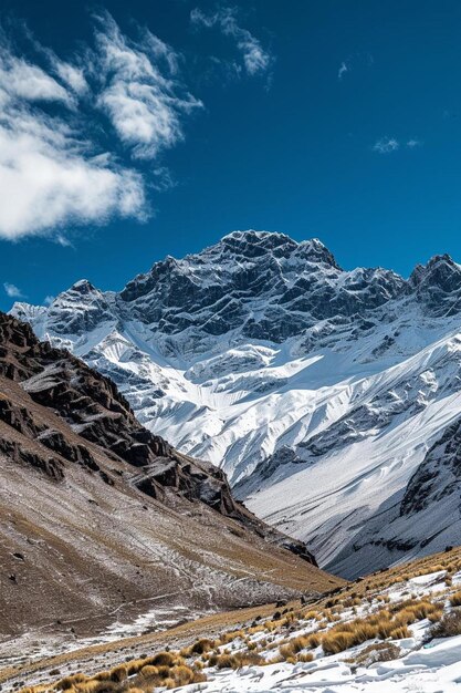 Photo a person riding a snowboard down a snow covered slope