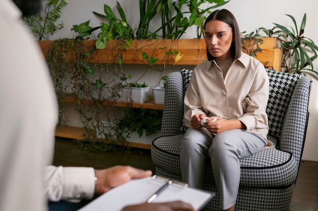 Photo person sharing feelings and emotions during therapy session