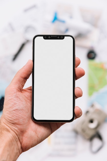 Photo a person showing blank white screen display on smartphone