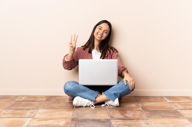 Person sitting on the floor over isolated background