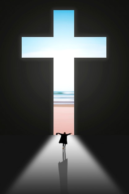 person standing in front of cross sign
