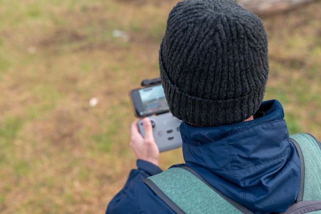 Person using drone remote control