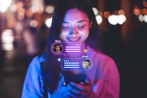 Person using electronic device with social network-related bubbles around them to celebrate social media day