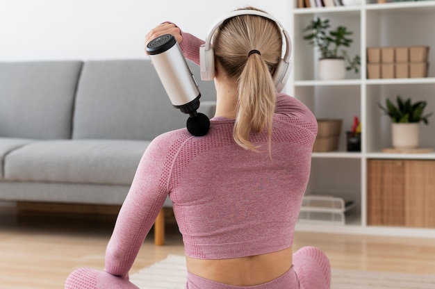 Person using massage gun