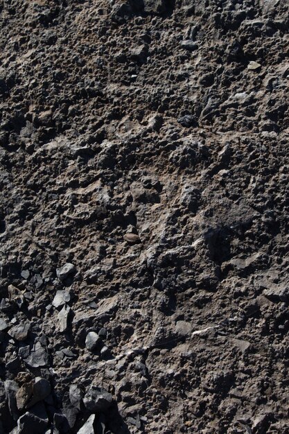 A person walking in the sand