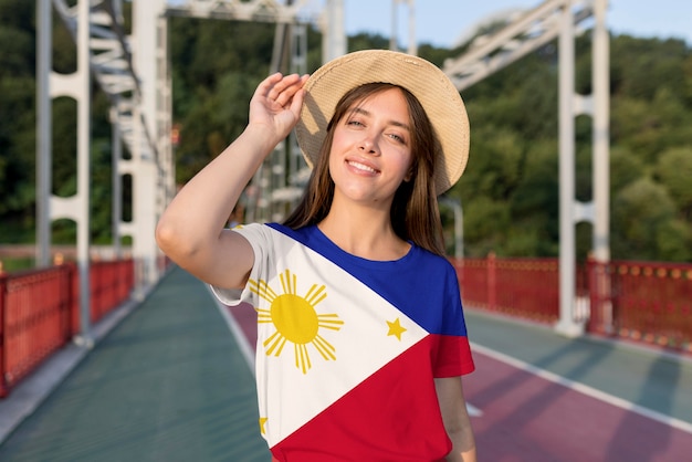 Person wearing clothing with philippines flag