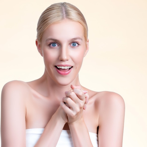 Personable woman with surprise facial expression in isolated background