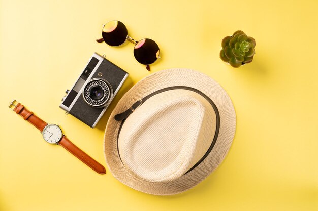 personal accessories on yellow background