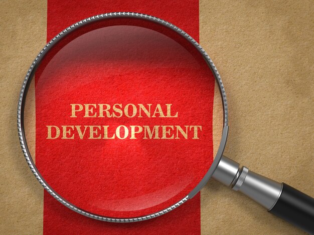 Personal Development concept. Magnifying Glass on Old Paper with Red Vertical Line Background.