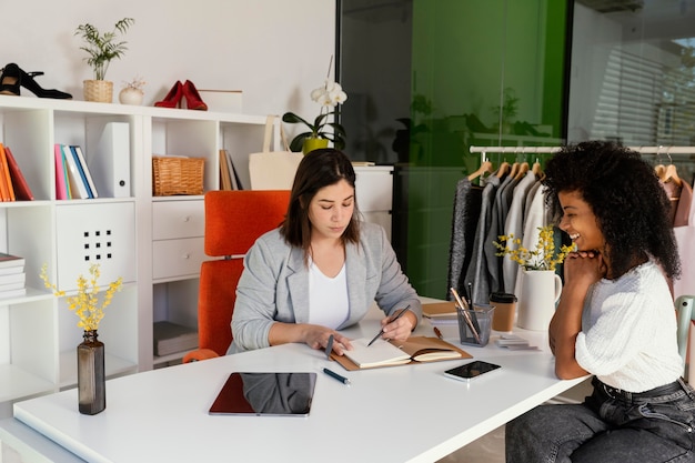 Personal shopper at office with client