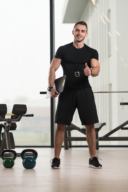 Personal Trainer With Clipboard