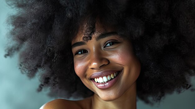 a persons voluminous and captivating afro resembling a cascade of curly clouds