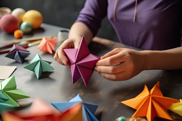 Persoon die origami-ster maakt met gekleurd papier voor vakantiedecoratie gemaakt met generatieve ai