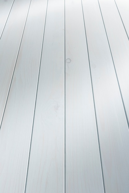 Perspective of painted wooden board with white chalk paint