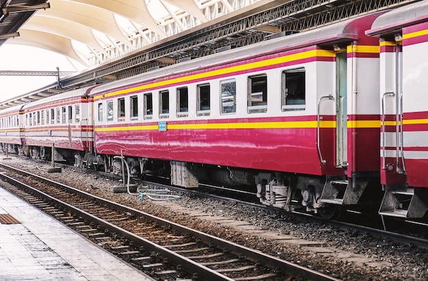 Perspective side view of train bogies waiting for departure at main central station