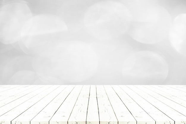 Photo perspective white wooden table on top over blur natural background