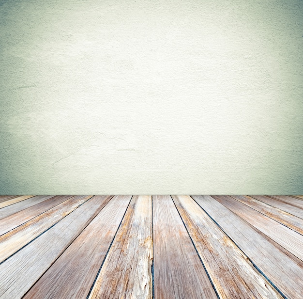 Perspective wood over cement wall background