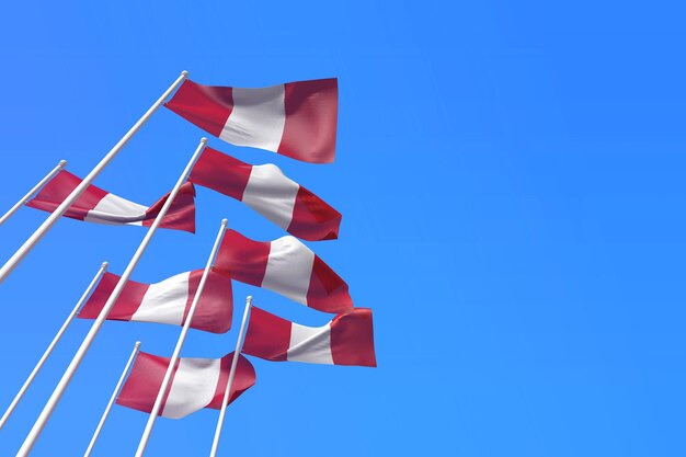 Peru flags waving in the wind against a blue sky d rendering