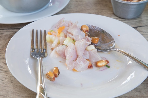 Peruvian ceviche cebiche raw fish bowl on white plate Peru food