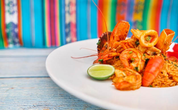 Peruvian food arroz con mariscos A sea food selection served with rice top view Selective Focus