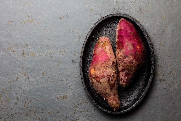 Peruvian raw sweet potatoes on a plate