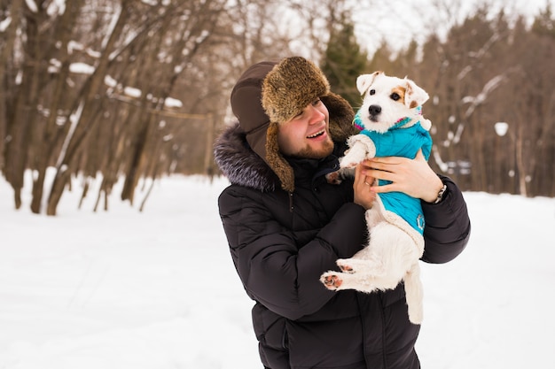 Pet owner, dog, and people concept