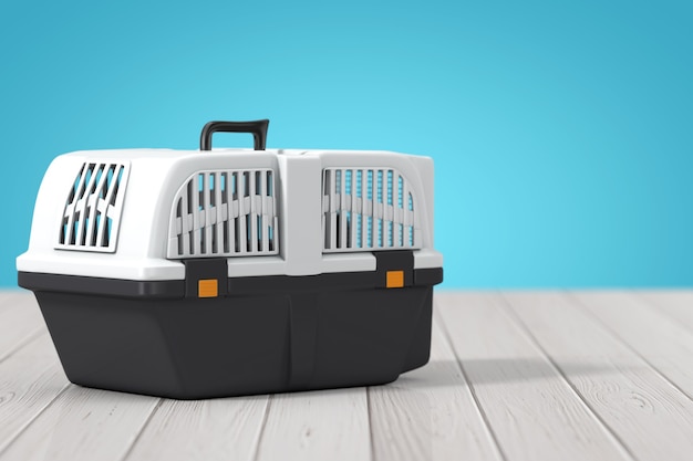 Pet Travel Plastic Cage Carrier Box on a wooden table. 3d Rendering