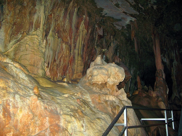 Petralona cave, Ancient karst cave with stalactites and stalagmites, Cenote ceiling limestone decor