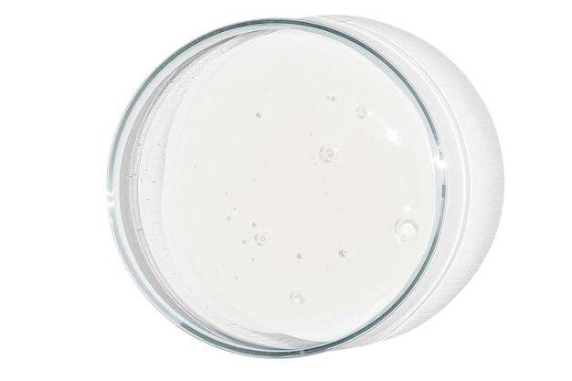 Petri dish isolated on empty background A smear of a transparent gel serum in a Petri dish