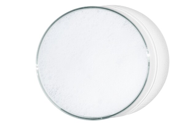 Photo petri dish isolated on empty background white foam in a petri dish