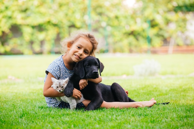 Pets giving their love to small children