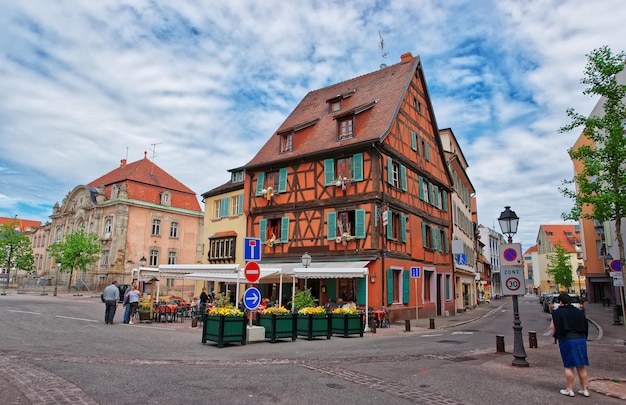 Pfeffel restaurant in half timbered style on Unterlinden Street in the Old city center of Colmar, Haut Rhin in Alsace, in France. People on the background