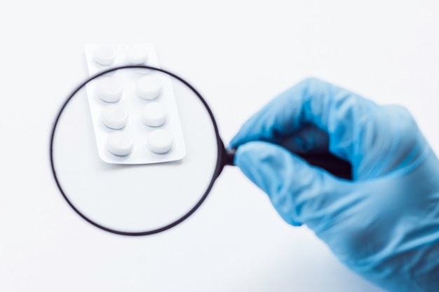 Pharmaceutical expert checks quality of medicine compliance