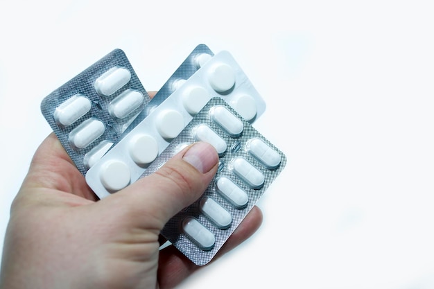 Pharmaceuticals antibiotic tablets in different colors