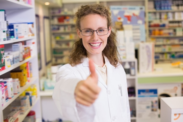 Pharmacist holding her thumb up 