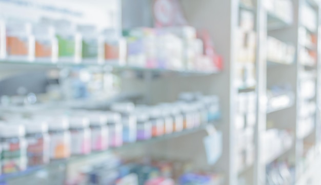 Photo pharmacy drugstore shelves interior blurred abstract background