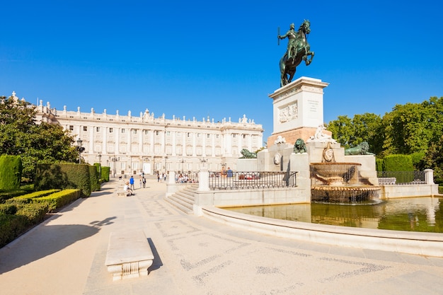 Philip IV of Spain monument and Royal Palace of Madrid, the official residence of the Spanish Royal Family in Madrid, Spain