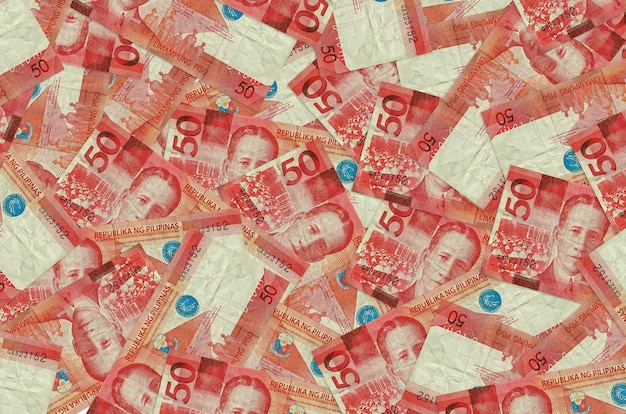 필리핀 piso 지폐는 큰 더미에 놓여 풍부한 생활 개념적 배경 큰 금액